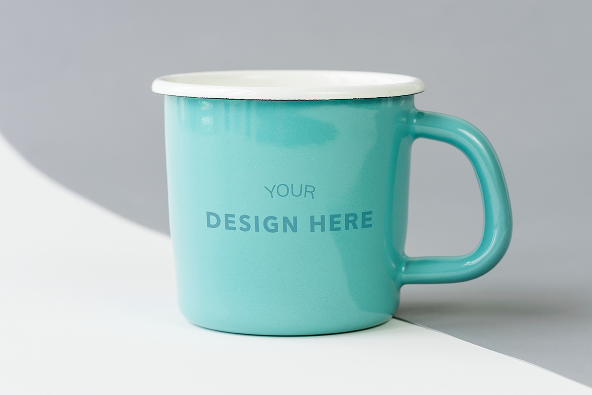 Teal enamel mug mockup with customizable design area, representing personalized enamel mugs for promotional use.